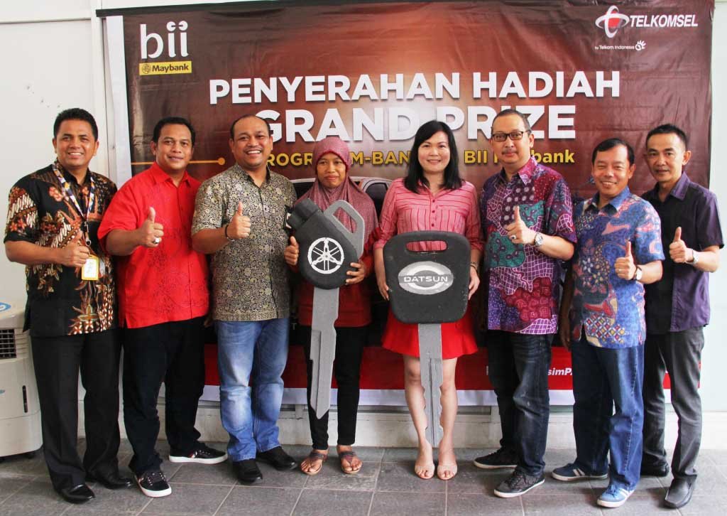 Telkomsel Serahkan Utama Mobil Datsun GO+