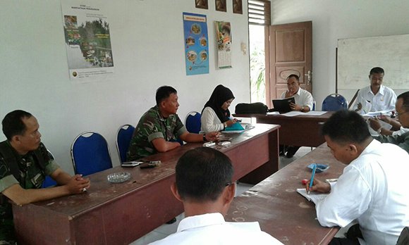 BABINSA KORAMIL 08/SECANGGANG HADIRI RAPAT EVALUASI PERTANIAN