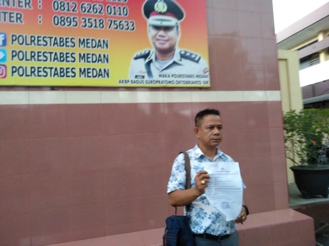 Dituding Merampas Uang dan Todongkan Senpi, Ketua Pewarta Laporkan Jukir di Polrestabes Medan