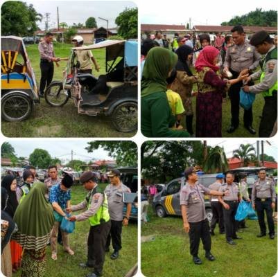 Polsek Medan Area Bagi 200 Nasi Bungkus di Komplek Aspol