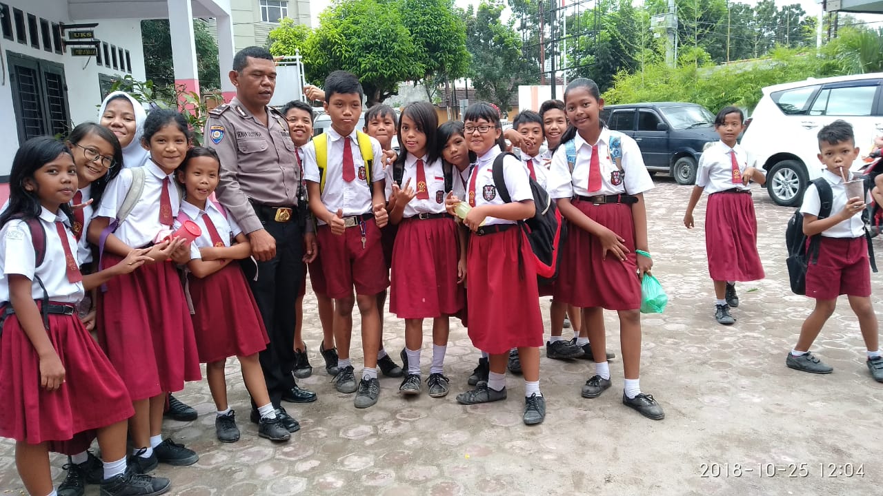 Sambangi SDN 20112, Polsek Medan Baru Sampaikan Pesan Kamtibmas