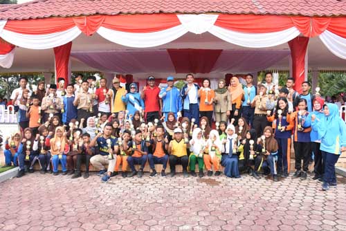 Bupati Ashari Tambunan Serahkan Penghargaan di Peringatan Haornas ke-36