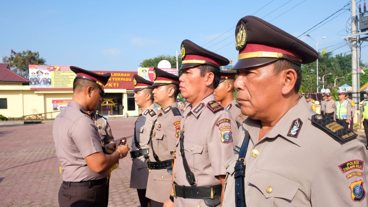 KapolresTanjung Balai Pimpin Sertijab Kasat Reskrim dan Kasat Binmas