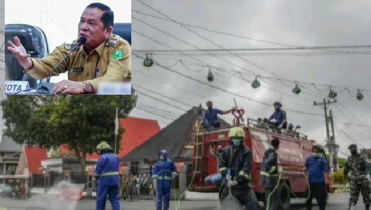 Cegah COVID-19, Wali kota PSP Irsan Efendi  Kerahkan Damkar Semprot  Disinfektan