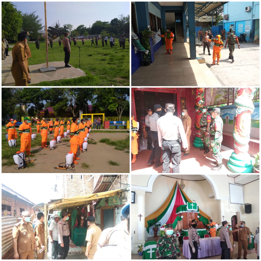 Apel Gabungan Muspika Medan Helvetia Semprotkan Disinfektan di Lapangan Bola Kaki Balai Desa Helvetia