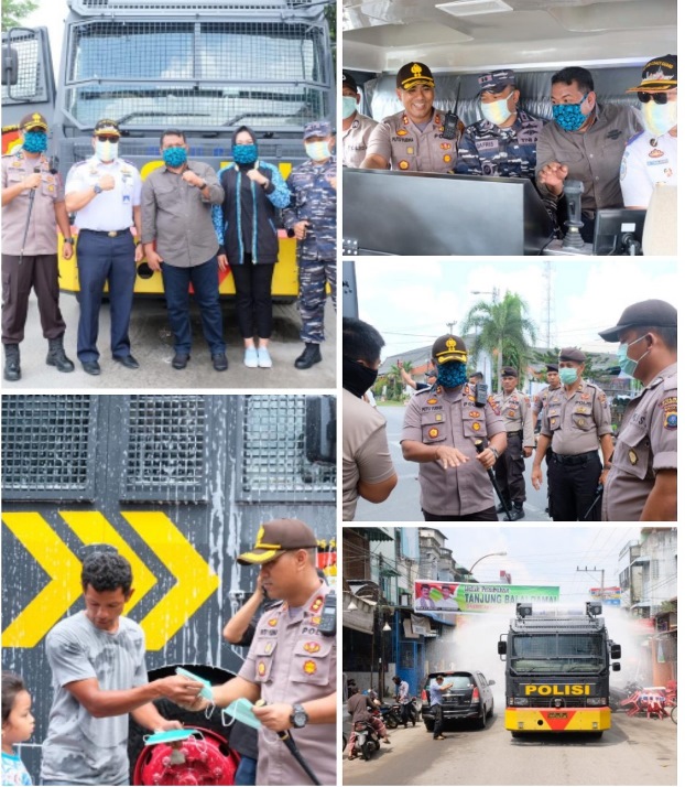Sinergitas Polres Tanjung Balai dan Forkopimda Cegah Covid-19 Semprotkan Disinfektan