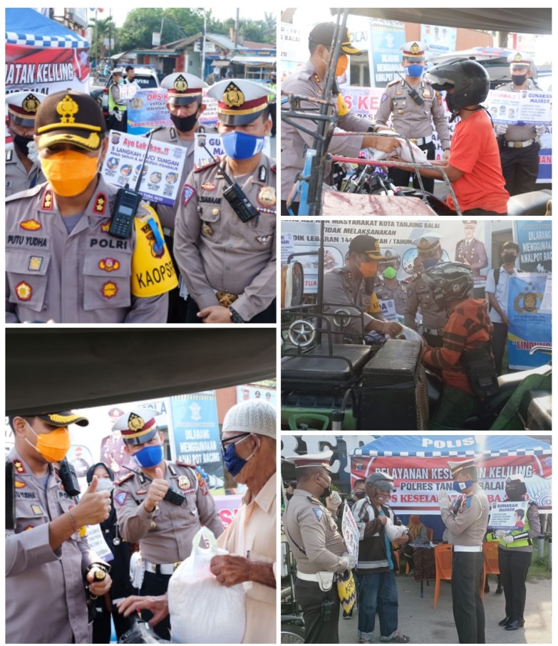 Polres Tanjung Balai Berikan Sembako Tertib Berlalulintas Kepada Pengendara Ops Kesemalatan Toba 2020