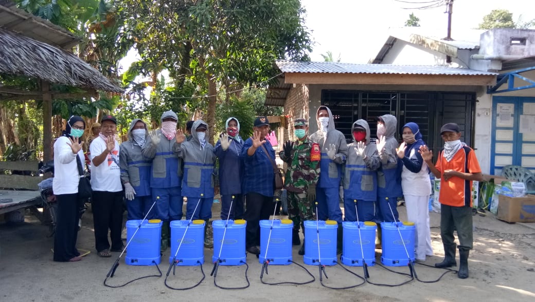 Puskesmas Petatal Bagi 1.000 Masker Untuk 10 Desa dan Penyemprotan Disinfektan