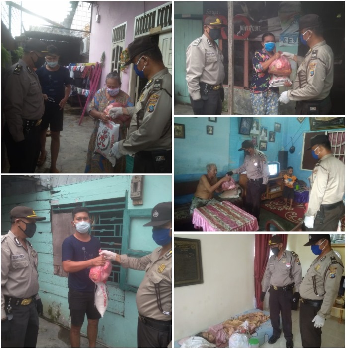Kapolsek Medan Timur Bagikan 10 KK Paket Sembako