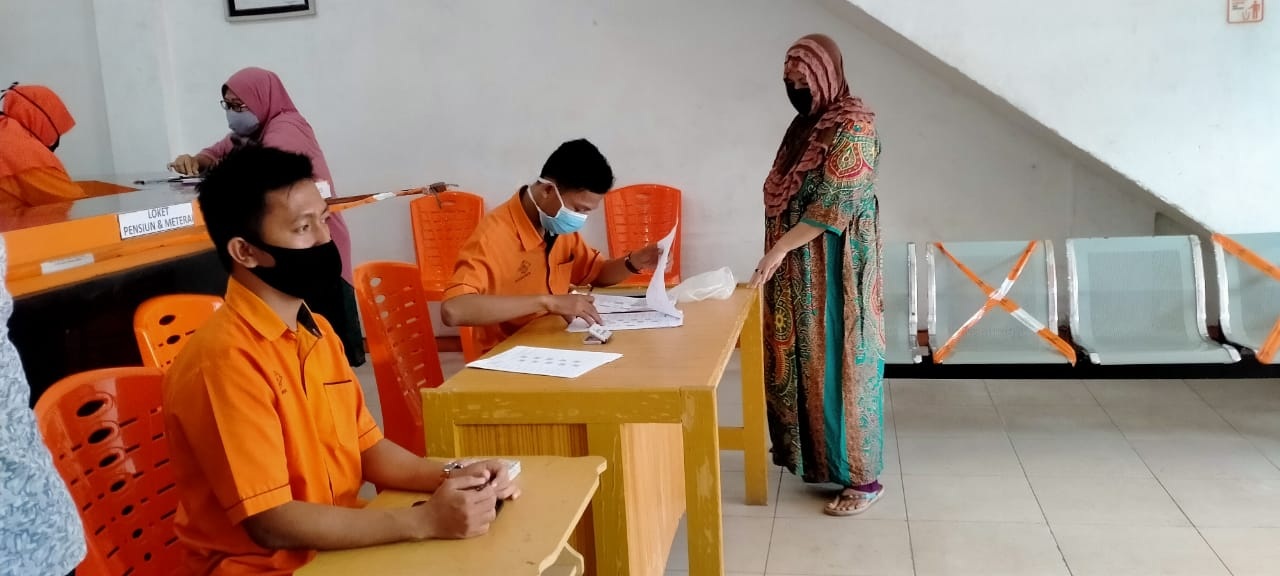 Polsek Perbaungan Kawal Distribusi BST Di Kantor Pos