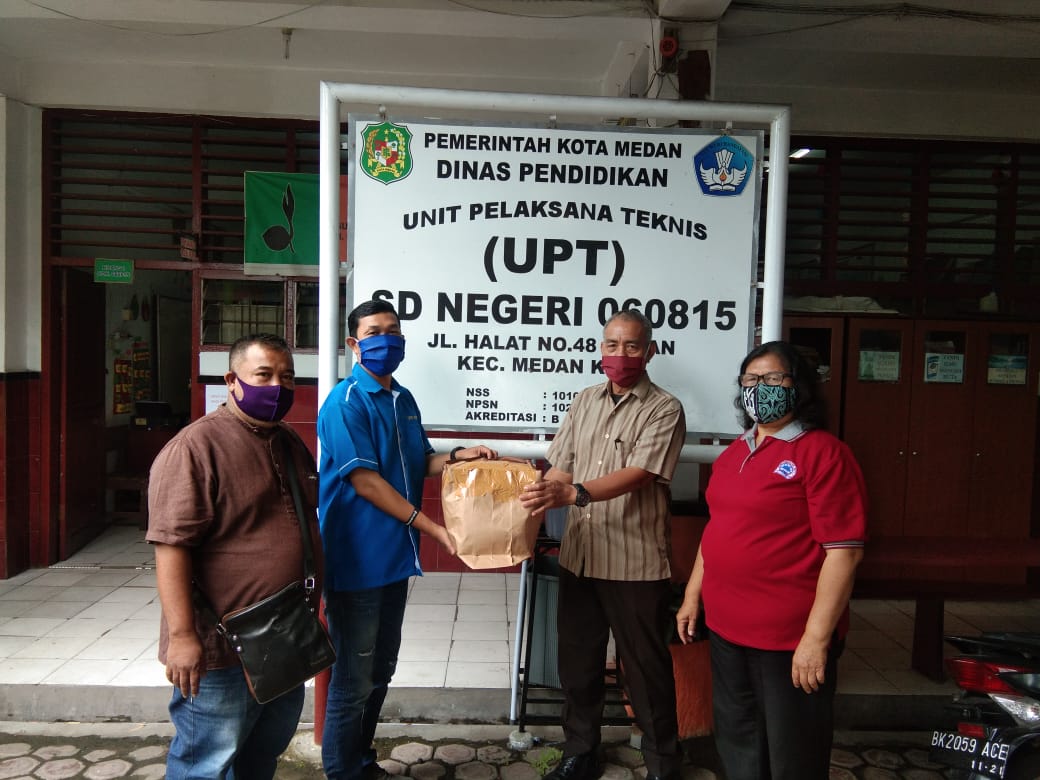 KNPI Sumut Bagikan Masker ke SD Negeri di Medan