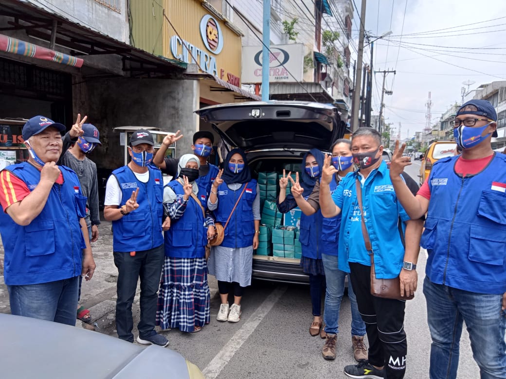 Berbagi Nasi Kotak, SATU HATI Sosialisasi Prokes dan Pilkada Medan 2020