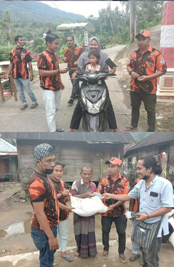 Peduli Covid 19, PAC PP Tambangan Bagi Masker dan Sembako