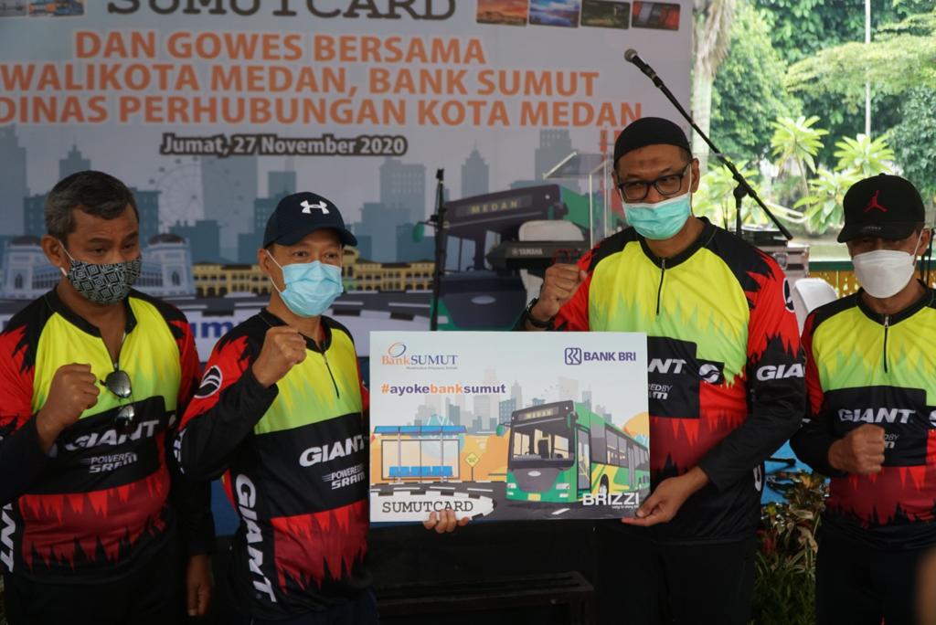 CO-Branding Dengan BRI, Bank Sumut Luncurkan SUMUT CARD Perdana di Moda Transportasi Bus Trans Metro Deli