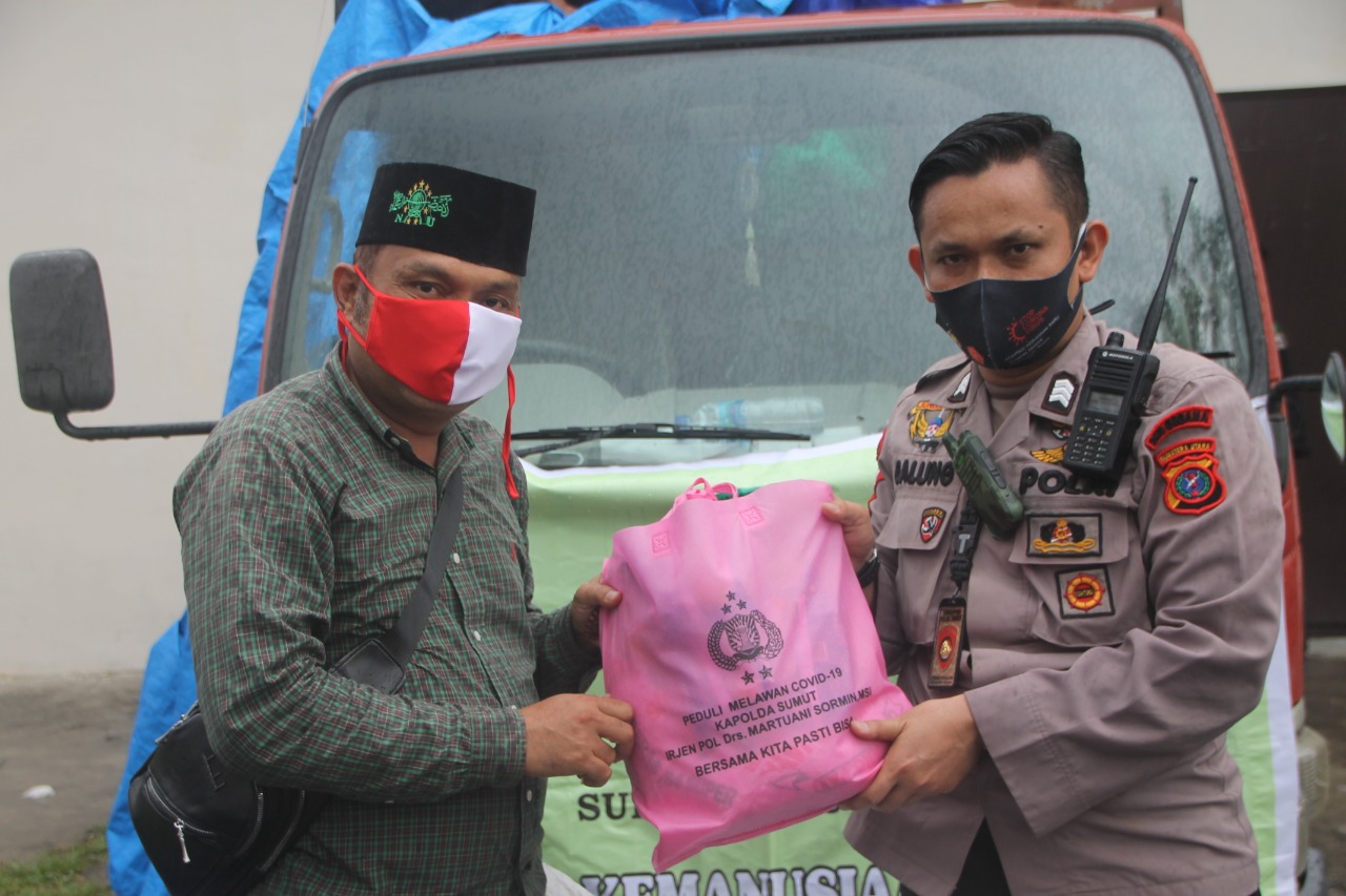Bakopam Sumut Salurkan 1000 Paket Sembako Bantuan Kapoldasu Kepada Terdampak Covid19 dan Korban Banjir