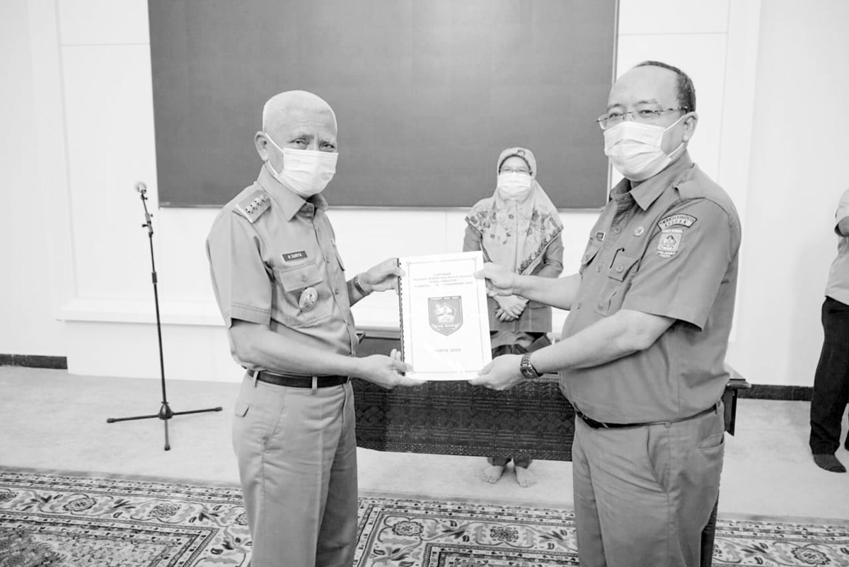 Pjs Bupati Serah Terima Laporan ke Bupati Asahan di Rumdis Gubsu