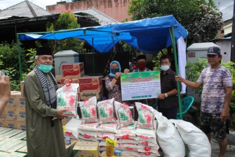 PTPN IV Bantu Korban Banjir Medan Maimun