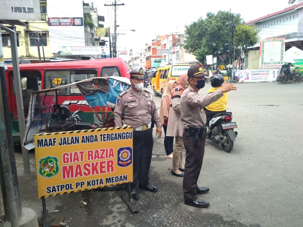 Bersama Tiga Pilar, Polsek Medan Area Gelar Ops Yustisi Pelanggar Protkes Covid-19 dan Berbgi Masker Gratis