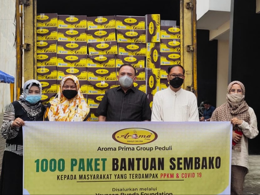 Hj Bunda Indah dan CEO PT Aroma H Suhardi Salurkan 1000 Paket Bantuan Terdampak PKKM