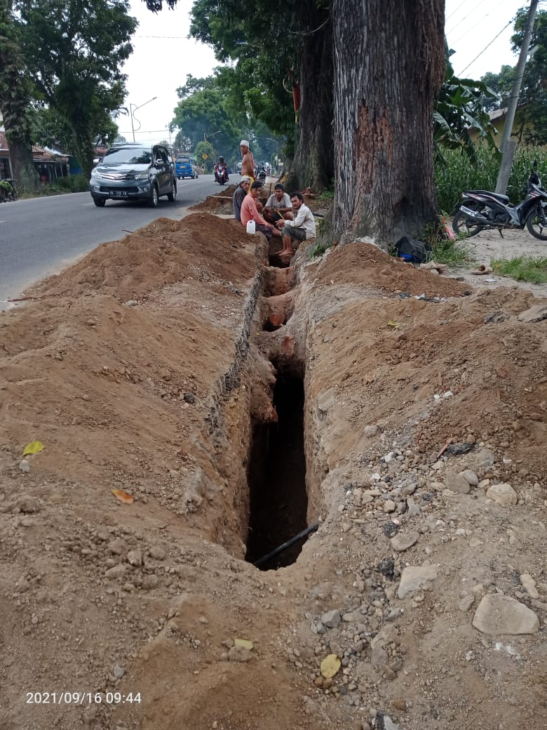 PDAM TIRTAULI  SIANTAR RUSAKI BAHU ASPAL  JALAN PROPINSI