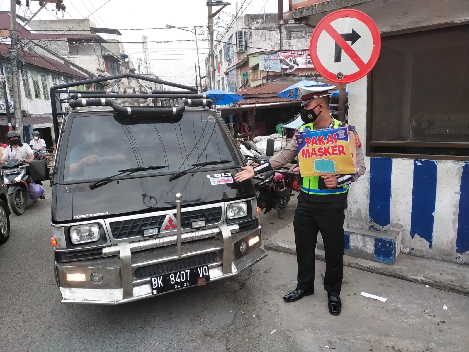 Sat Lantas Polres Tanjung Balai mensosialisasikan Pengunaan Masker