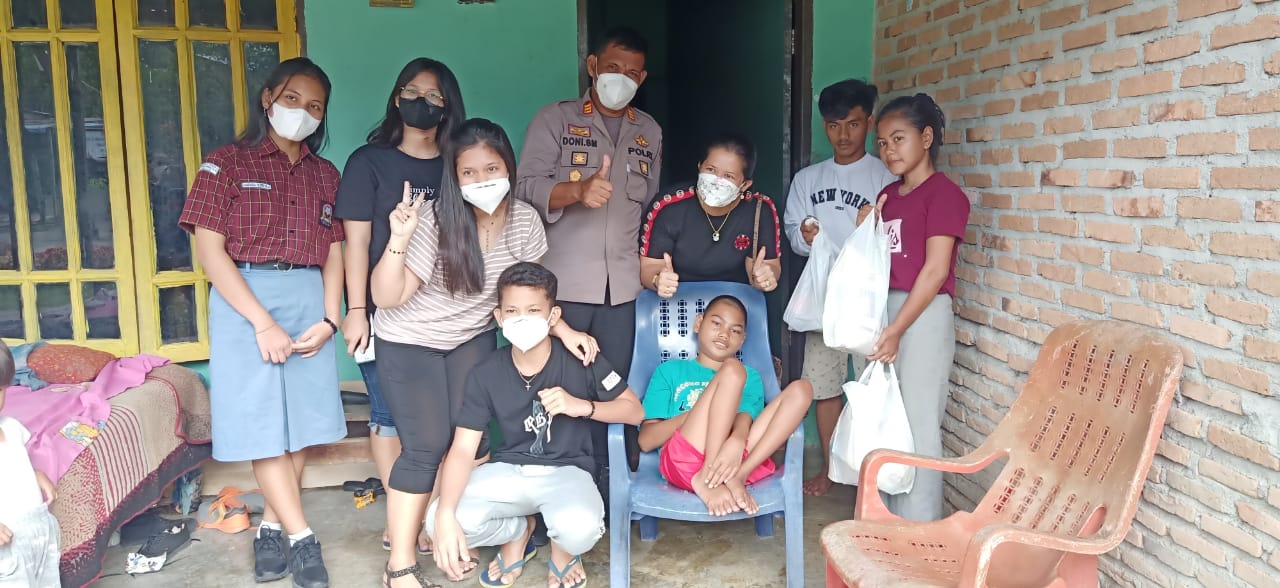 Kapolsek Beringin AKP Doni Simanjuntak Berbagi Dengan Penyandang Disabilitas,Agar Anak Saya Peduli dengan Orang Susah