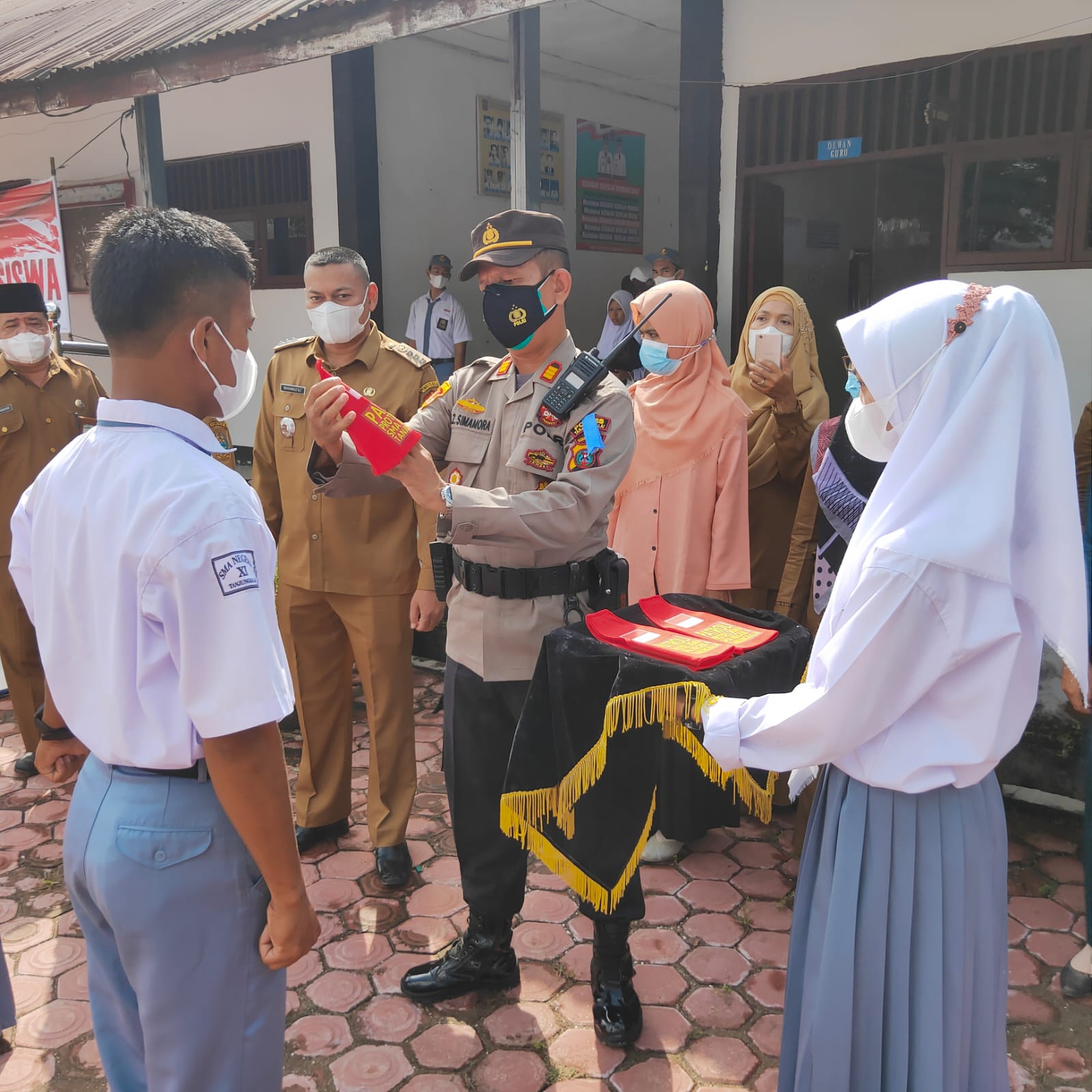 Polres Tanjung Balai Pimpin Pembentukan Patroli Prokes Siswa di SMU N 4 Teluk Tibung