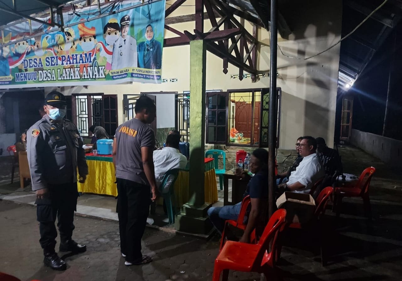 Polsek Sei Kepayang Polres Asahan Memobilisasi Vaksinasi Covid-19 di Dusun I Balai Desa Sei Paham