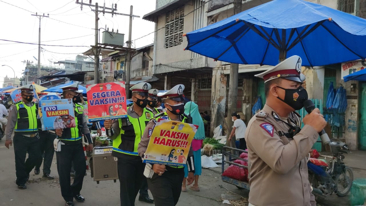 Ops Lilin Toba 2021, Sat Lantas Polres Tanjung Balai Himbau Warga Laksanakan Vaksin