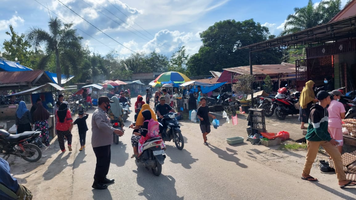 Beri Rasa Aman Kepada Pengguna Jalan, Personel Polsek Prapat Janji  Polres Asahan Atur Lalu Lintas Sore