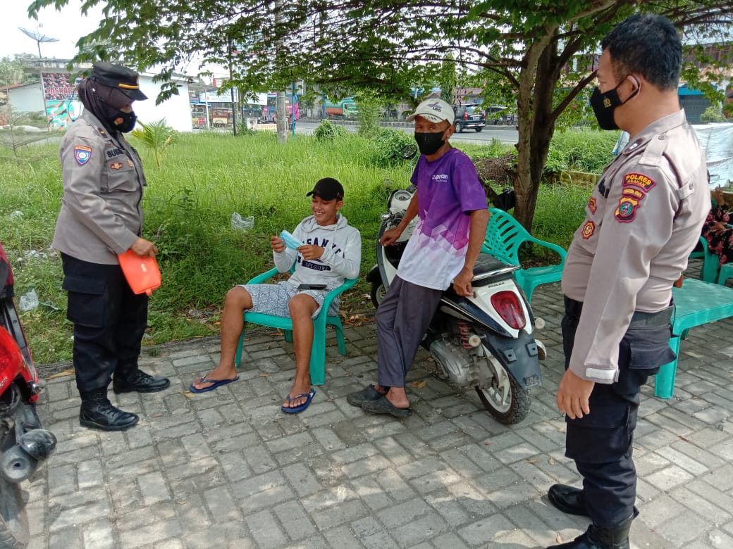 Personel Sat Binmas Polres Asahan Laksanakan Himbauan dan Penerangan Keliling