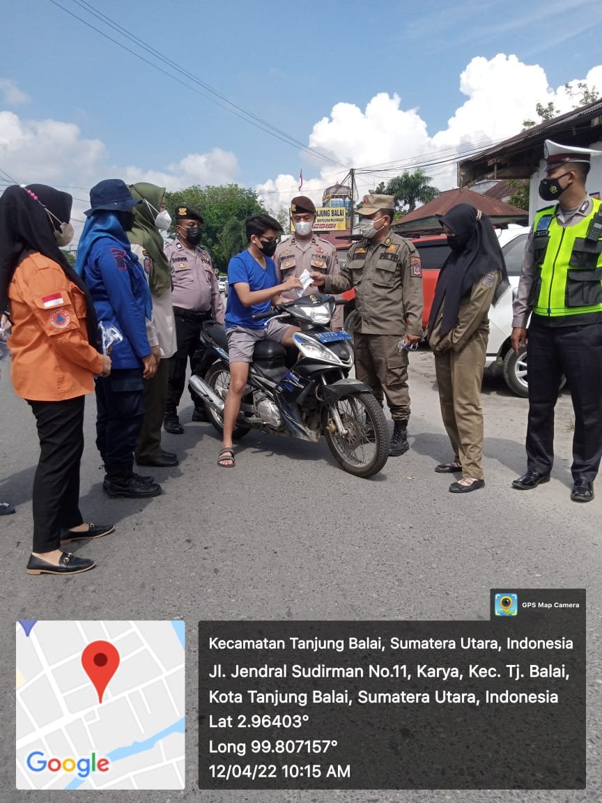 Personil Gabungan Ops Yustisi Bagikan 394 Pcs Masker Secara Gratis di Kota Tanjung Balai