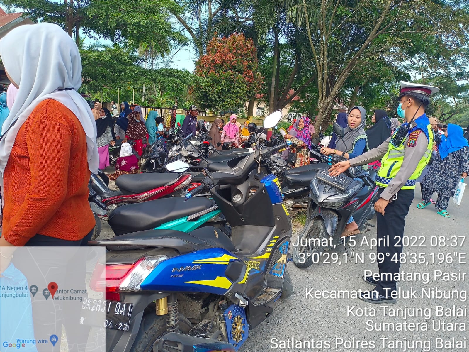 Satlantas Polres Tanjung Balai Laksanakan Pengamanan dan Penertiban Parkir Saat Pembagian BLT