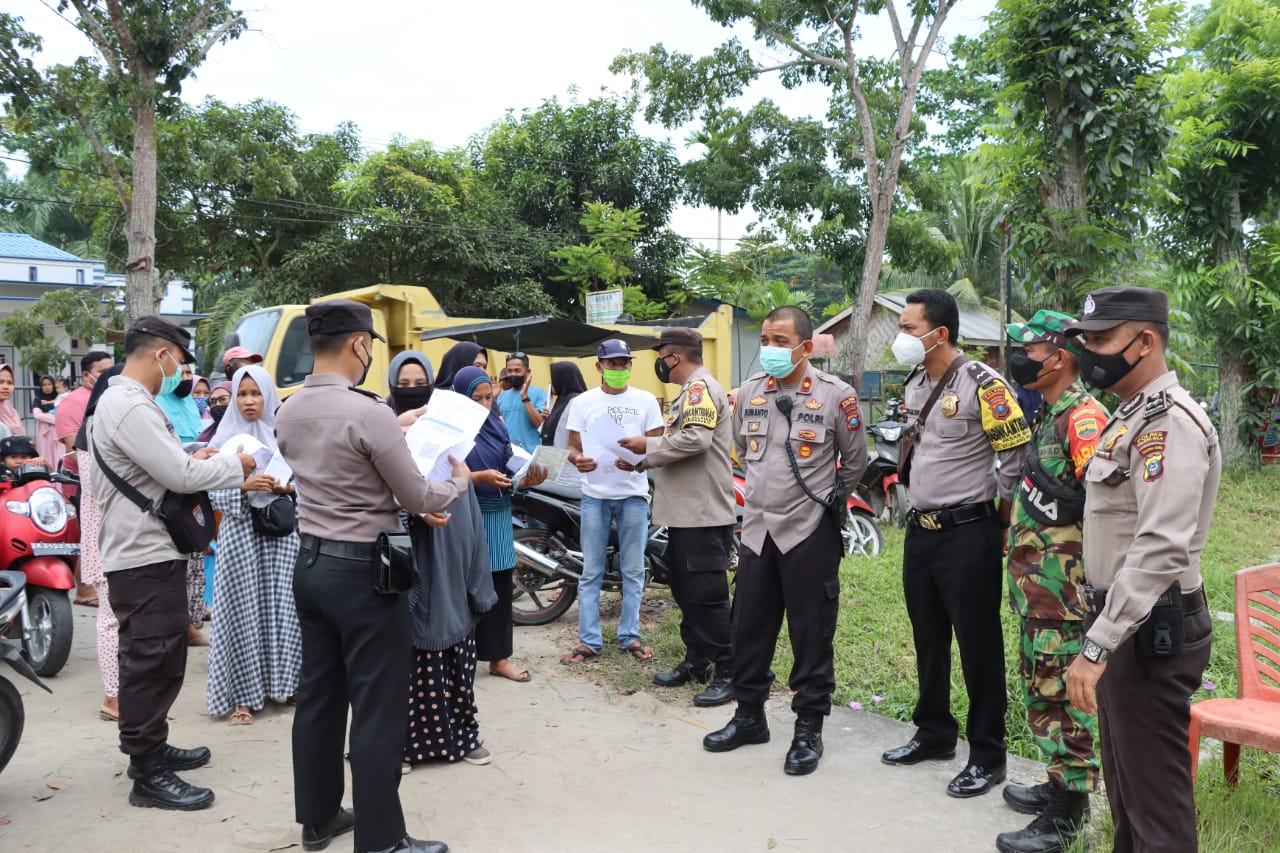 Kapolres Tanjungbalai Tinjau Penyaluran BLT dan Vaksinasi Bagi Masyarakat