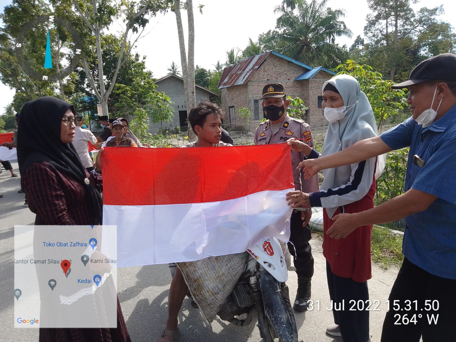 Kanit Binmas Polsek Air Joman Polres Asahan Hadiri Gerakan Pembagian 10 Juta Bendera Merah Putih