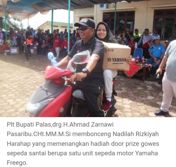 Dapat Hadiah Doorprize Sepada Motor, Boru Harahap Di Bonceng Plt Bupati Palas