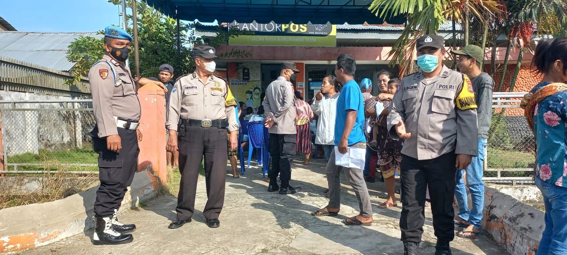 Pastikan Penyaluran Pembagian BLT Berjalan Aman Dan Lancar, Polsek Namorambe Laksanakan Kegiatan Monitoring