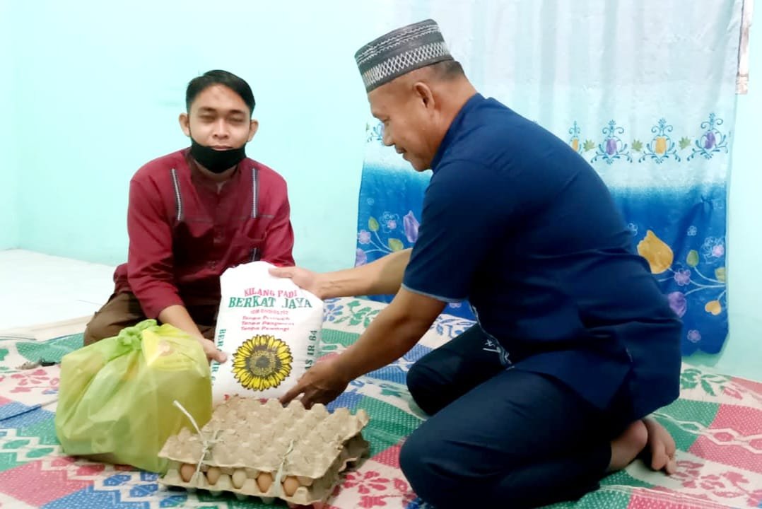 Ringankan Beban Masyarakat, Sat Intelkam Polresta Deli Serdang Bagikan Bansos Kepada Masyarakat Terdampak Kenaikan BBM