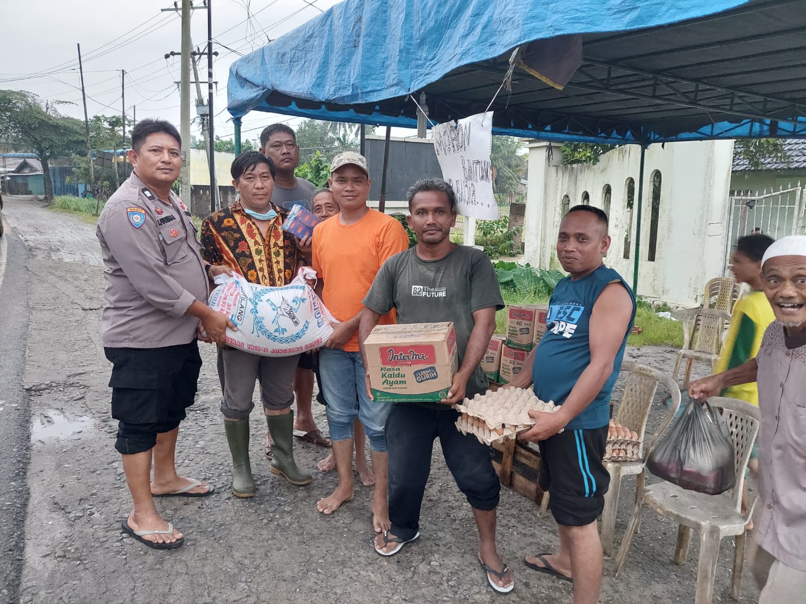 Rumah Warga Bunut Terendam Banjir, Kapolsek Kota Kisaran Peduli