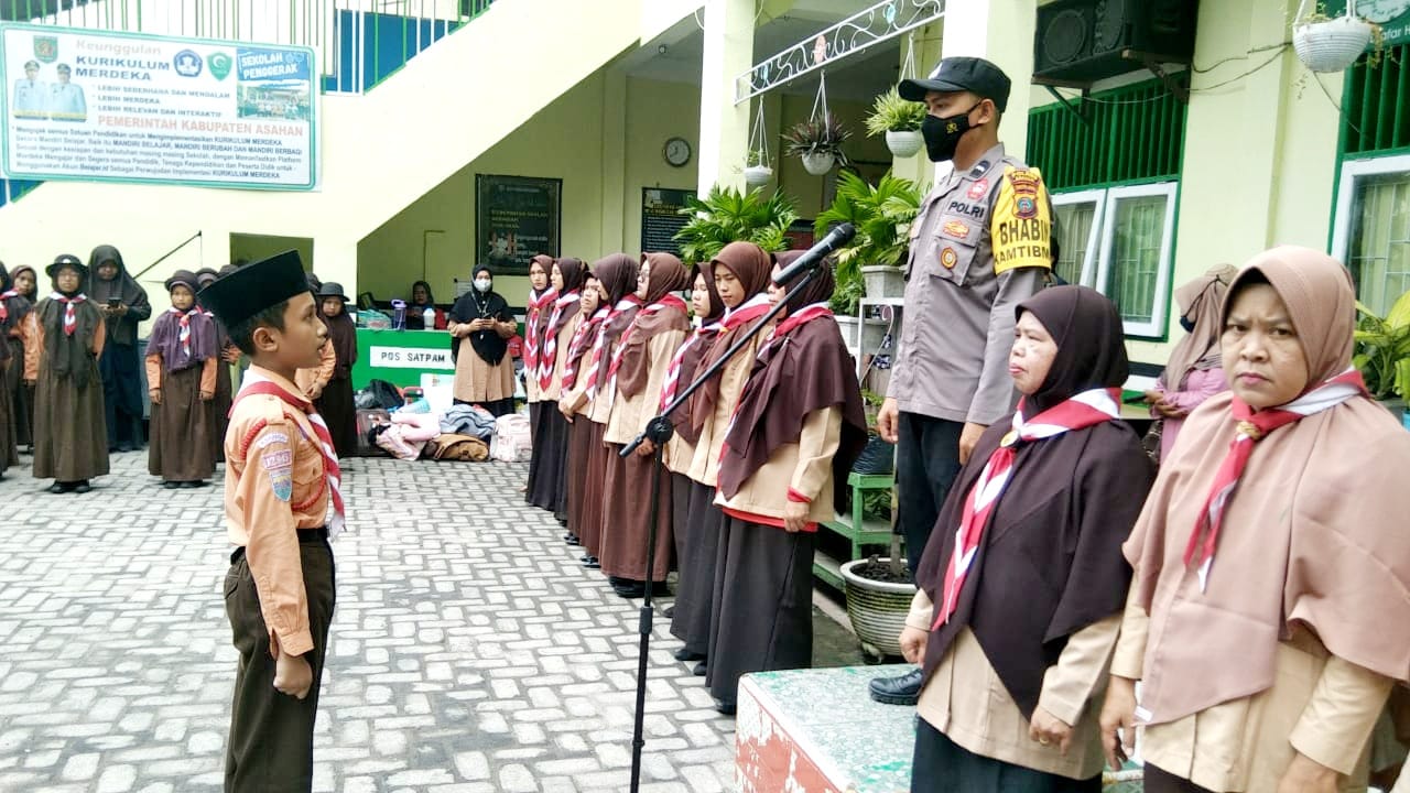 Anggota Bhabinkamtibmas Aipda Adi Citra Panjaitan Irup Penutupan Pramuka