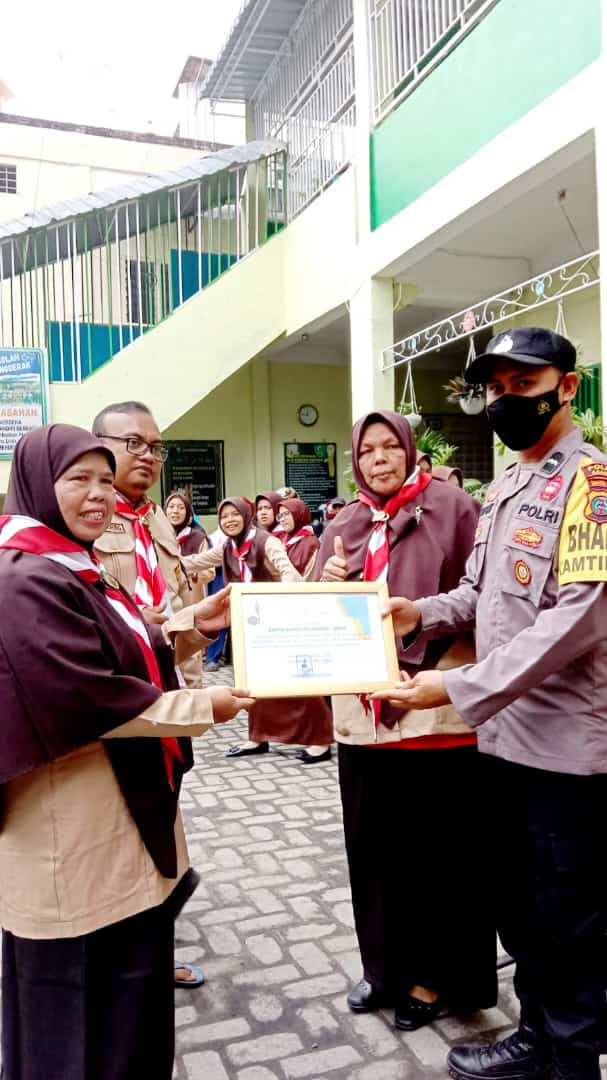 Anggota Bhabinkamtibmas Aipda Adi Citra Panjaitan Irup Penutupan Pramuka