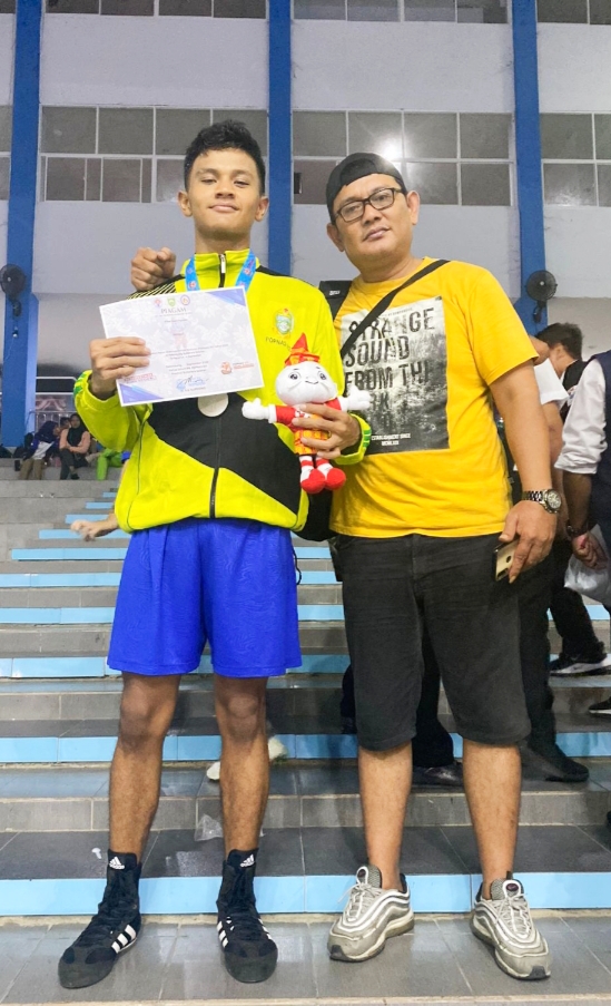 Julian Sihotang Raih Perak Cabor Tinju Popnas 2023 Utara