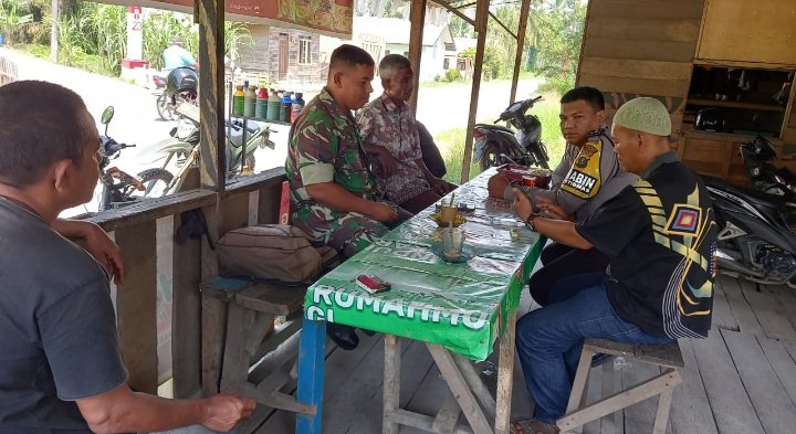 Personel Polsek Sei Kepayang Melaksanakan Cooling System di Desa Sei Lendir