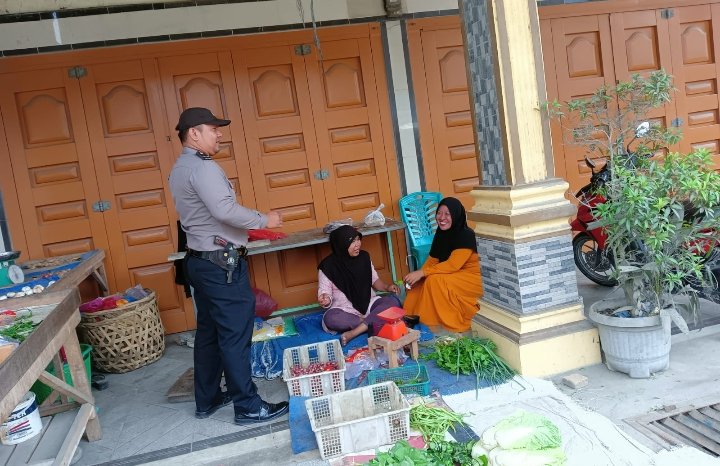 Personel Polsek Air Joman Laksanakan Cooling System di Lingkungan XII