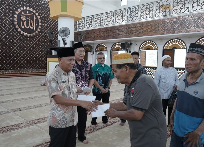 Bupati Asahan Salurkan Santunan Kepada Anak Yatim dan Tukang Becak