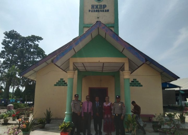 Personel Polsek Sei Kepayang Jaga Situasi Kamtibmas di Gereja