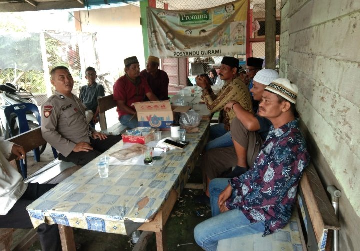 Personel Polsek Air Joman Ajak Masyarakat Laksanakan Cooling System