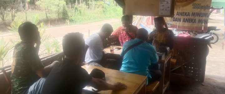 Personel Polsek Bandar Pulau Sampaikan Coolling System di Desa Gajah Sakti