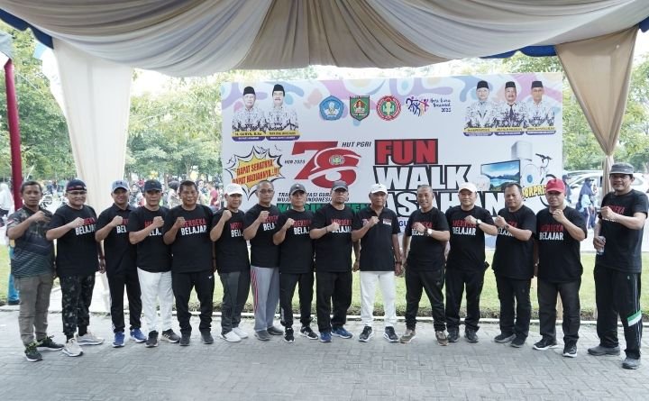 Bupati Asahan Lepas Gerak Jalan Santai Dalam Rangka Hari Guru Nasional dan HUT ke-78 PGRI