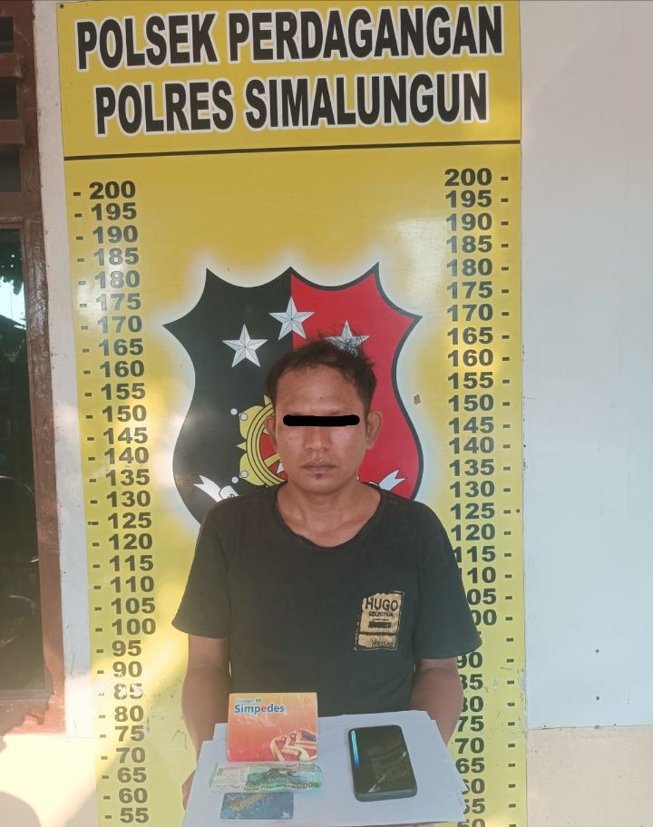 Lagi Tulis Tebak Angka, 'HG' Berhasil Diciduk Polsek Perdagangan di Sala Satu Warkop